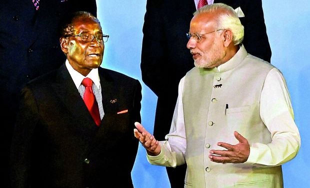 PM Narendra Modi interacts with Zimbabwe President Robert Mugabe in New Delhi (Photo: PTI) PM Narendra Modi interacts with Zimbabwe President Robert Mugabe in New Delhi (Photo: PTI)